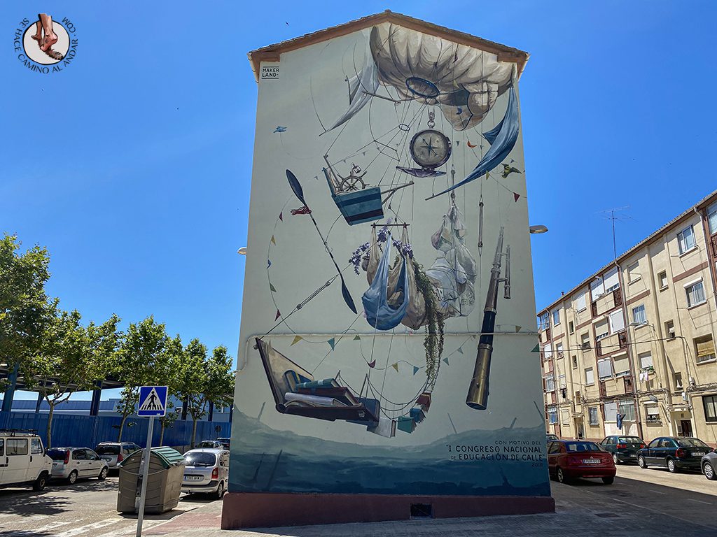Arte urbano Zamora fachada alegoria educacion